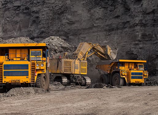 trucks working at coal mine